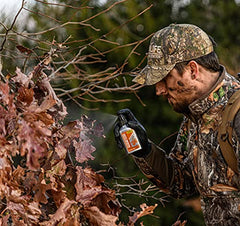 Wildlife Research Center Acorn Masking Scent sprayer attachment ready for quick application
