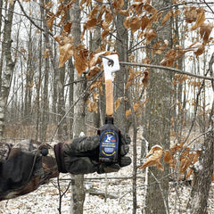 Buck-Fire Raging Estrus in hunting scene suggests effective lure for deer.