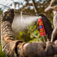 Wildlife Research Center Golden Doe attractant bottle enhances field scent cues for wildlife encounters.