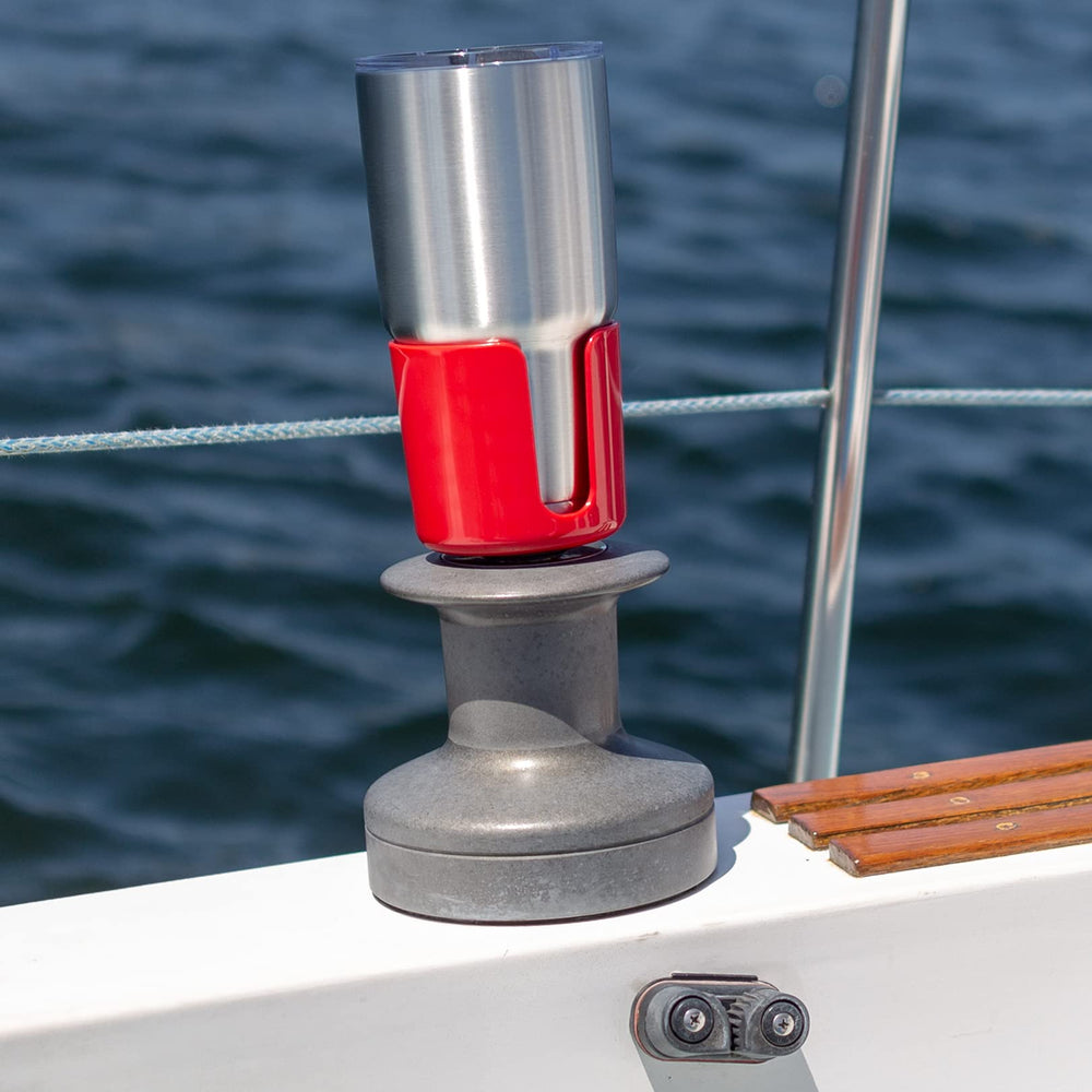 Winch Caddy Plus attached to a sailing winch on a boat.