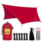 Wise Owl Outfitters hammock rain fly folded, compact ultralight shelter option.