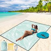 WIWIGO Beach Blanket sand-proof laid flat on sand for a clean setup.