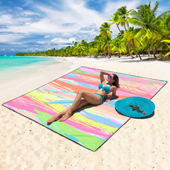 WIWIGO beach blanket with sand pockets keeps it stable on windy beaches.