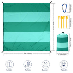 WIWIGO Beach Blanket anchored by stakes for quick, wind-resistant setup