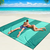 WIWIGO Beach Blanket spread on sand with stable corners for a secure picnic