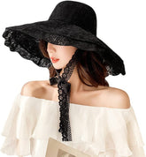 Black lace beach hat with wide floppy brim and adjustable chin strap