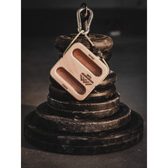 Workshop 19/50 hangboard front view—compact strength tool for on-the-go grip training.