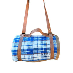 WP West Path blue, white, brown wool check blanket outdoors.