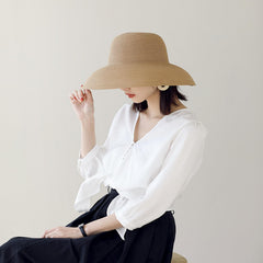 WUODHTW packable-foldable straw sun hat folds neatly for travel.
