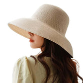 WUODHTW women's floppy wide-brim sun hat beige for beach shade and UPF 50+ protection