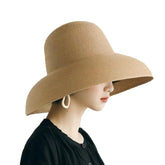 WUODHTW women's khaki floppy brim sun hat provides stylish shade for beach days.