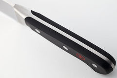 Wüsthof Classic 6-inch Utility Knife black handle offering durable grip.