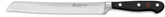 Wüsthof Classic 8-Inch bread knife blade close-up for precise crust slicing.