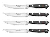 Wüsthof Classic blades close-up showing razor-sharp precision for clean cuts.