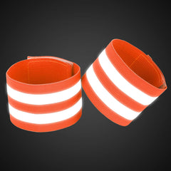 Wrist wearing orange reflective band by X AUTOHAUX during dusk cycling
