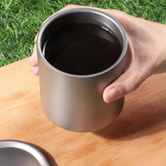 Yaregelun thermal-insulation titanium cup keeps beverages at temperature on the go.