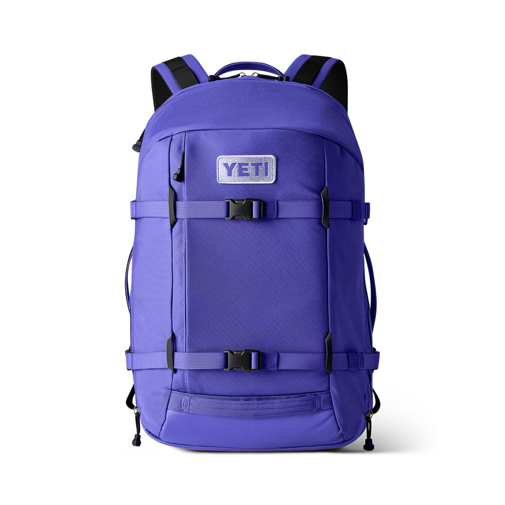YETI Crossroads 27L backpack front view showcases rugged ultramarine violet for daily commuting.