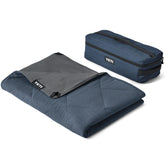 YETI Lowlands blanket navy fabric close-up shows durable, water-repellent surface for outdoor comfort.