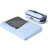 YETI Lowlands Blanket on travel bag for portable outdoor comfort on picnics.
