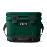 YETI Roadie 15 hard cooler in Black Forest Green – front view, compact for quick day trips.