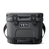 YETI Roadie 15 side-view shows compact cooler for road trips and picnics.