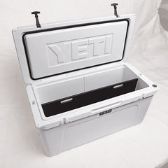 YETI Tundra divider durable-material doubles as a cutting board during trips.