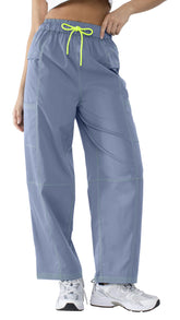 YIPINK women's hiking cargo pants wide-leg action shot for flexible outdoor movement