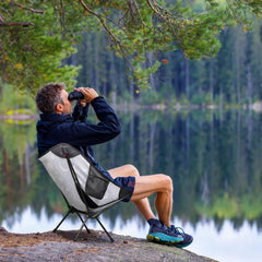 YLYNIU portable camping chair with storage bag keeps essentials within reach