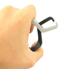 Compact, pocket-sized fish gripper showing 20 kg / 44 lb capacity