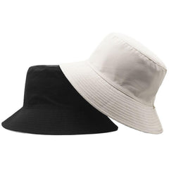 Front view of YTNKIV oversize bucket hat in black and beige
