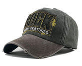 Front view of YULOONG Vintage Denim Trucker Cap with rock embroidery