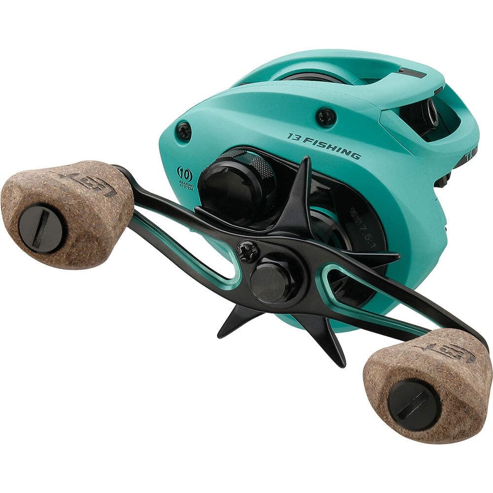 13 FISHING Concept TX2 baitcast reel in-use illustrates protective skull cap cover.