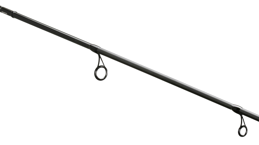 13 FISHING Defy Black 6'7\" spinning rod in action, showing strong hook-setting potential.