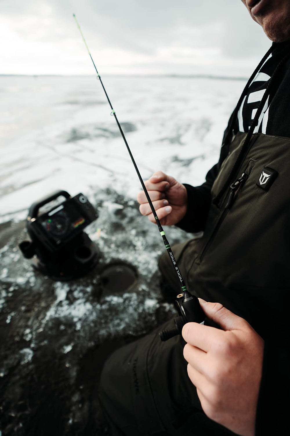 13 FISHING Tickle Stick ultralight ice rod for sensitive bites.