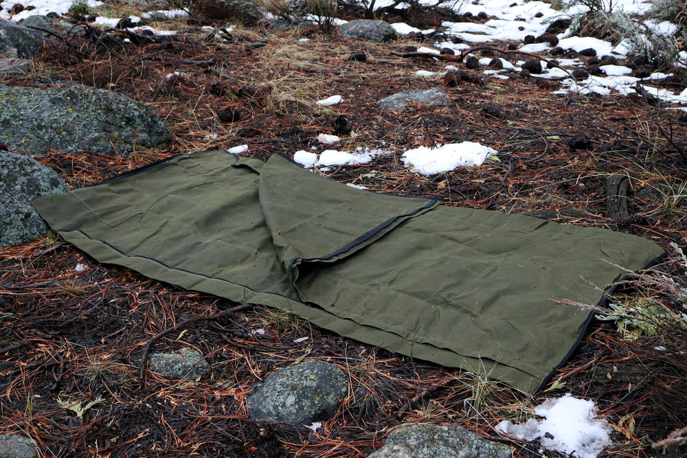 1844 Helko Werk bedroll with leather straps securing blanket inside.
