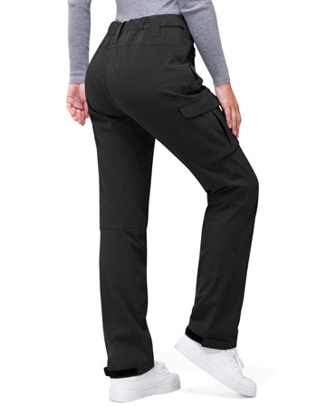 33,000ft women's rain pants pocket detail highlights secure storage on hiking trips