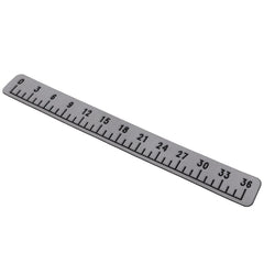 Close-up of the precision-etched measurement marks on the EVA foam fish ruler