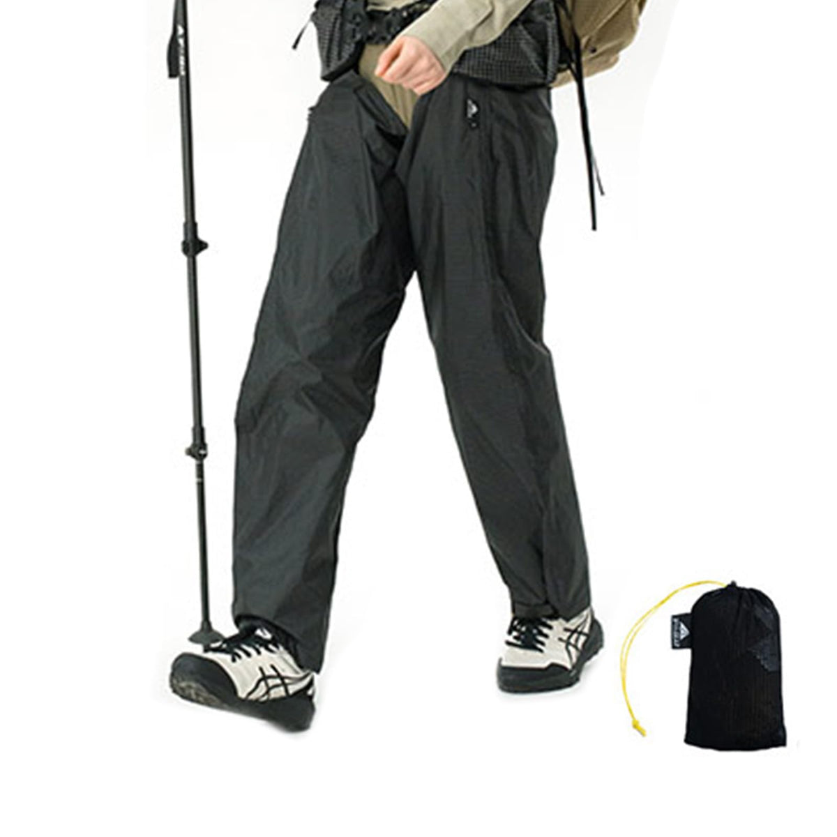 3F UL Gear packable rain pants folded in storage bag for portability.
