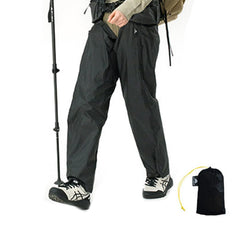 3F UL Gear packable rain pants folded in storage bag for portability.