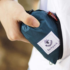 4Monster Daypack folded compact wallet-size demonstrates portable storage for trips