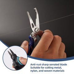 Close-up of titanium-coated line scissors cutting fishing line