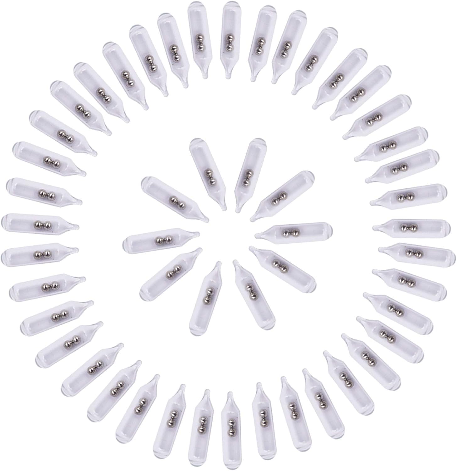 Close-up of glass rattles and insert tube for jig fishing lures