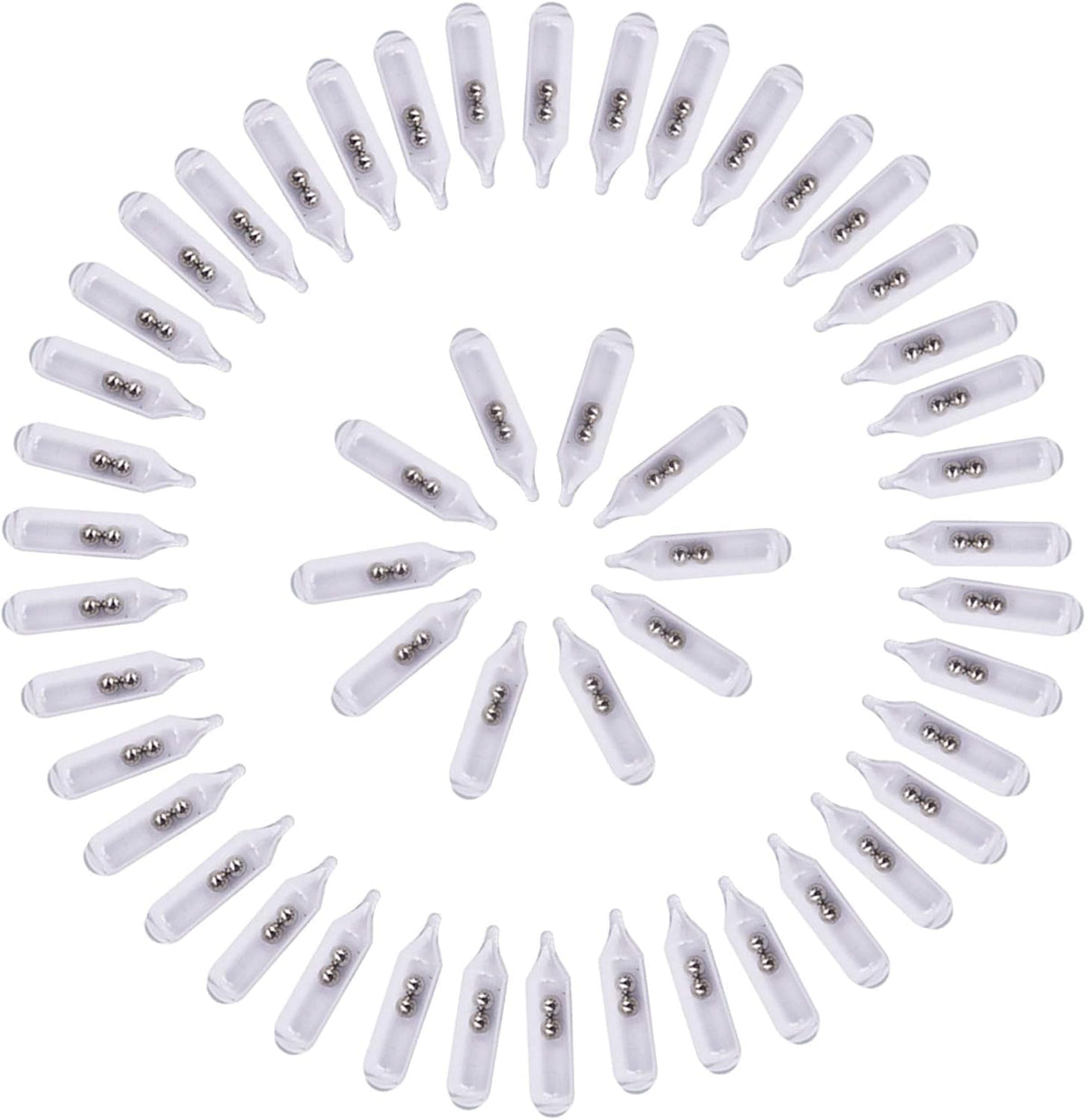 Close-up of glass rattles and insert tube for jig fishing lures