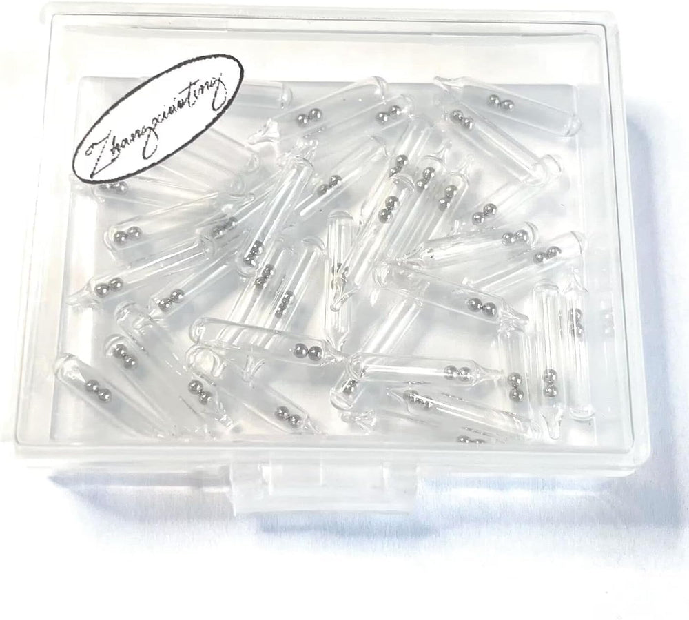 Materials: glass rattles and steel balls