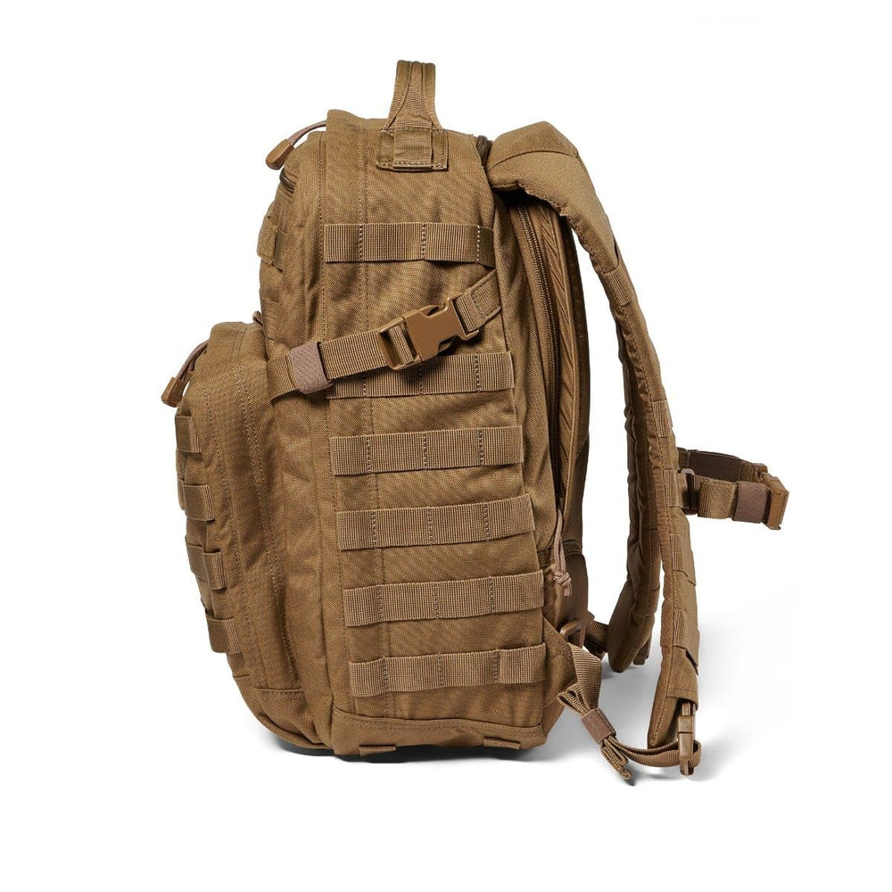 511 RUSH 12 2.0 backpack front lower pocket shows quick-access storage.