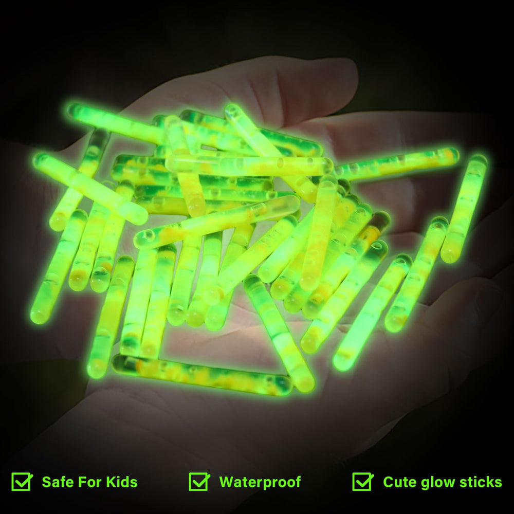 Glow sticks attached to fishing bobber and rod tip