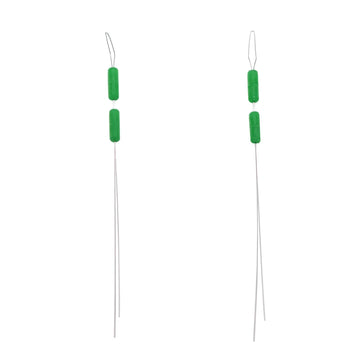 Close-up of green rubber fishing bobber stopper