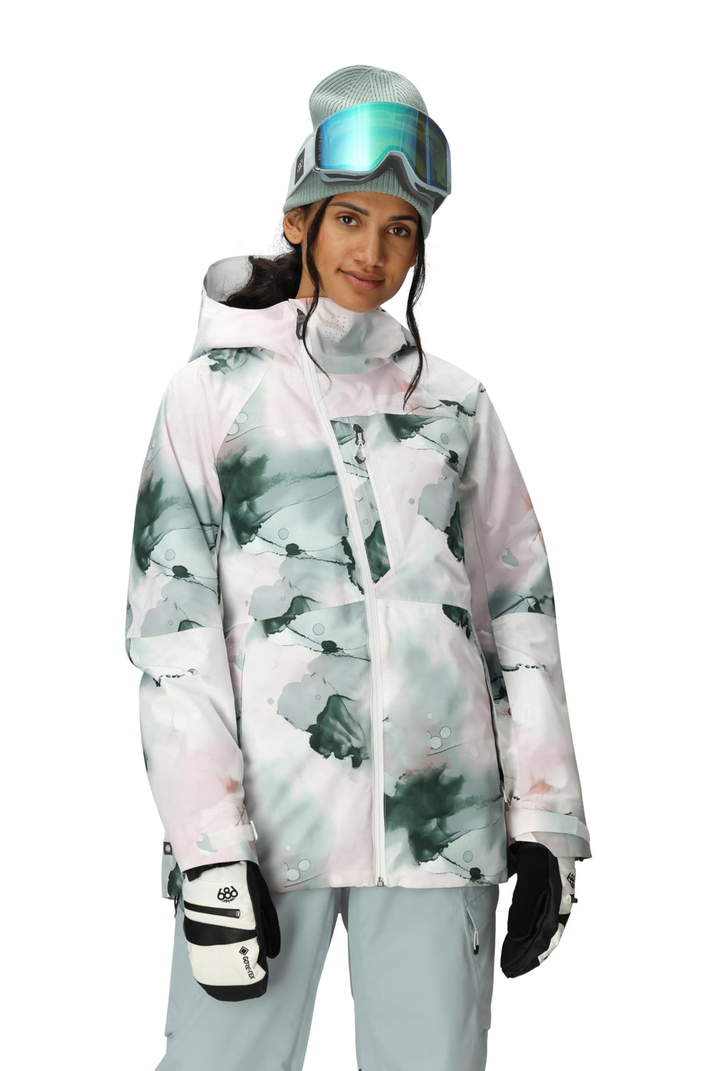 686 GLCR Hydra jacket on snowy slope lifestyle shot.