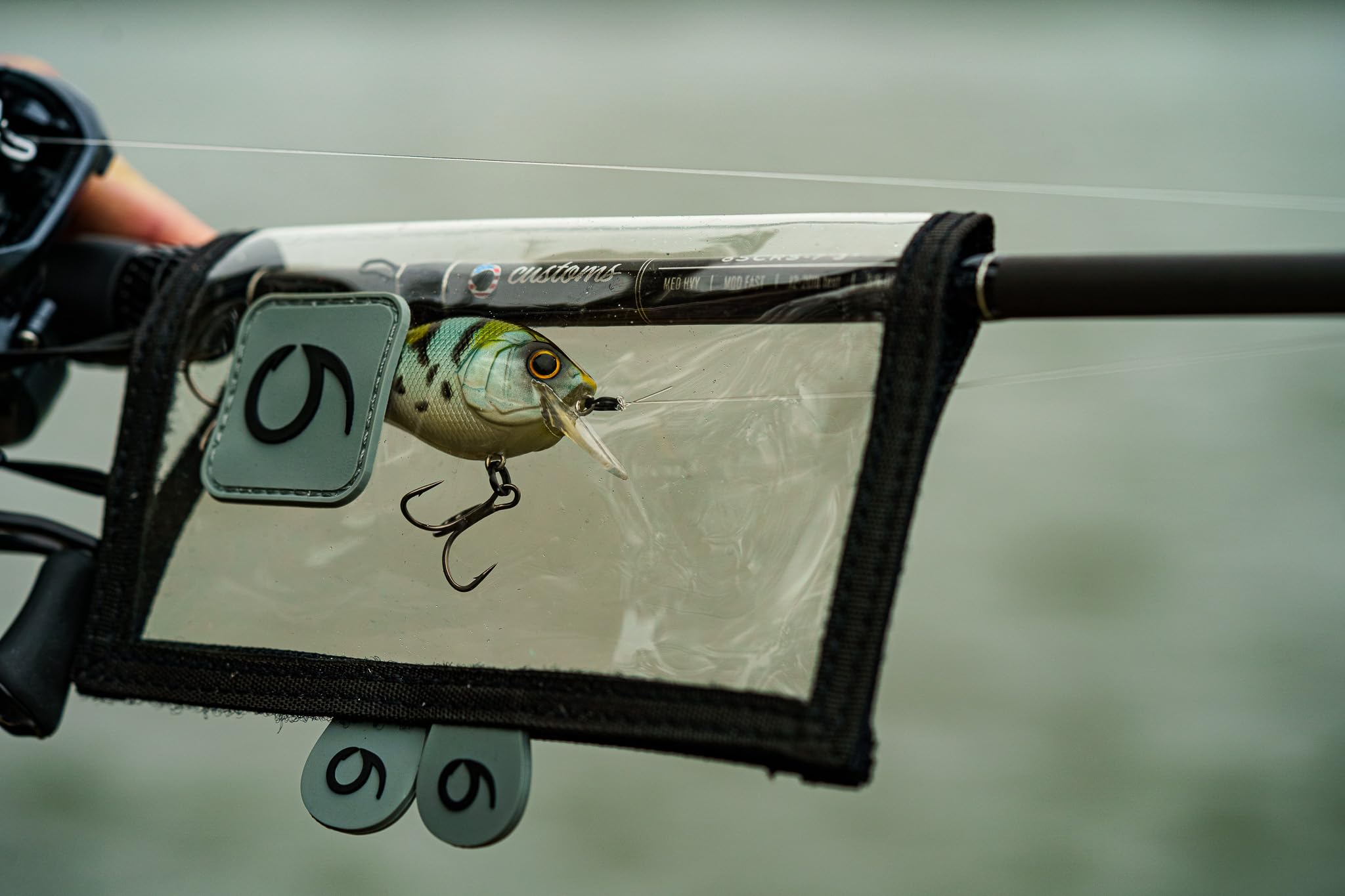 Three-size design of 6th Sense bait cover aids rod locker organization.