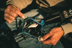 Close-up of treble hooks kept tidy by 6th Sense bait cover.